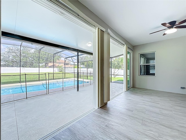 3731 Peaceful Valley Dr, Clermont, FL 34711 - unfurnished sunroom with ceiling fan