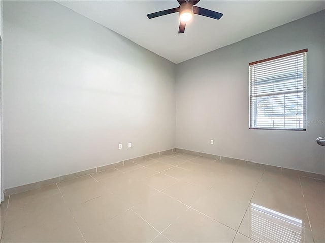 3731 Peaceful Valley Dr, Clermont, FL 34711 - empty room with ceiling fan and light tile patterned flooring