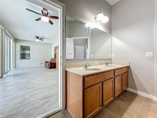 3731 Peaceful Valley Dr, Clermont, FL 34711 - bathroom with double vanity, ceiling fan, and tile patterned floors