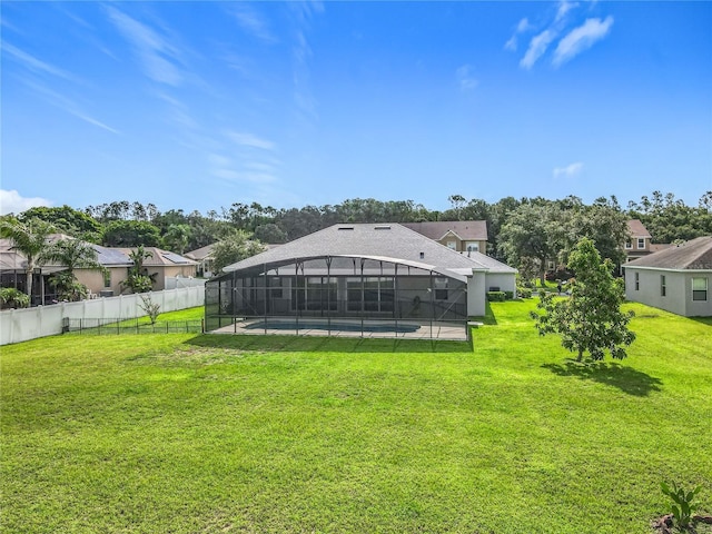 3731 Peaceful Valley Dr, Clermont, FL 34711 - view of yard featuring glass enclosure and a patio area