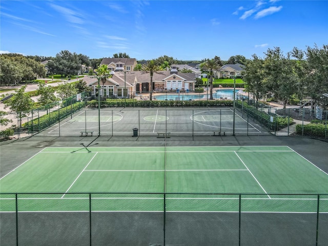 3731 Peaceful Valley Dr, Clermont, FL 34711 - view of tennis court with community basketball court and a community pool
