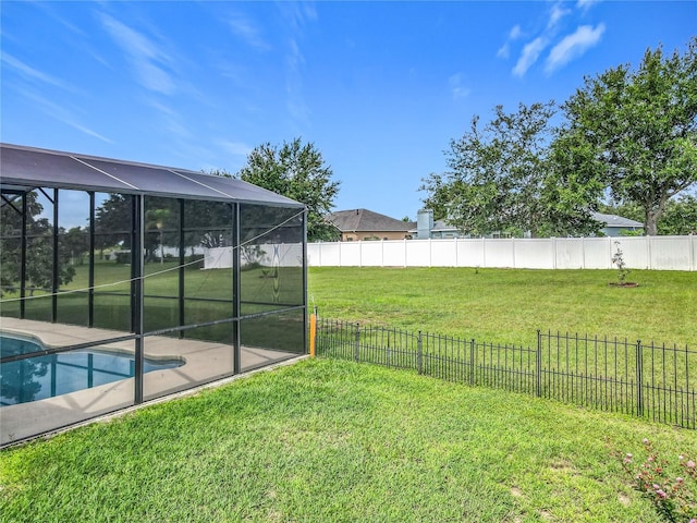3731 Peaceful Valley Dr, Clermont, FL 34711 - fenced backyard with a lanai