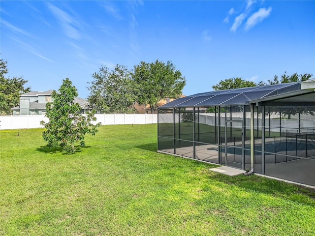 3731 Peaceful Valley Dr, Clermont, FL 34711 - fenced backyard featuring glass enclosure