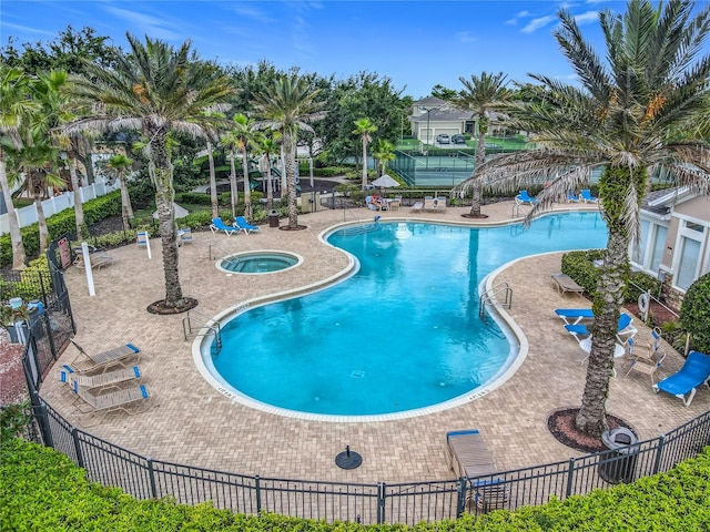 3731 Peaceful Valley Dr, Clermont, FL 34711 - community pool with a patio and a community hot tub