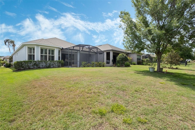 1027 Timbervale Trl, Clermont, FL 34715 - rear view of house featuring a lawn and a lanai