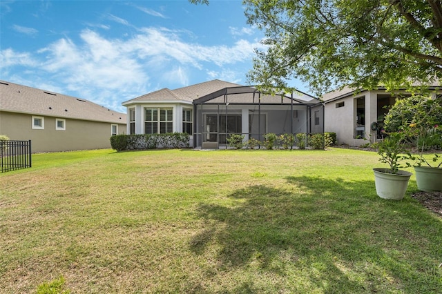 1027 Timbervale Trl, Clermont, FL 34715 - back of house with a yard and glass enclosure