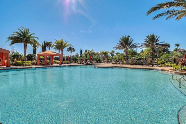 1027 Timbervale Trl, Clermont, FL 34715 - community pool with a gazebo