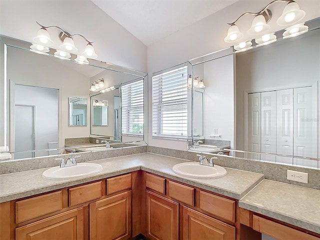 2202 Kershaw Rd, The Villages, FL 32162 - full bathroom featuring double vanity and lofted ceiling