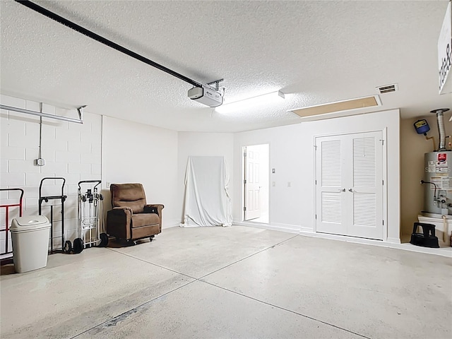 2202 Kershaw Rd, The Villages, FL 32162 - garage with secured water heater, a garage door opener, and french doors