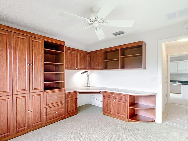 2202 Kershaw Rd, The Villages, FL 32162 - unfurnished office featuring built in study area, light colored carpet, and a ceiling fan
