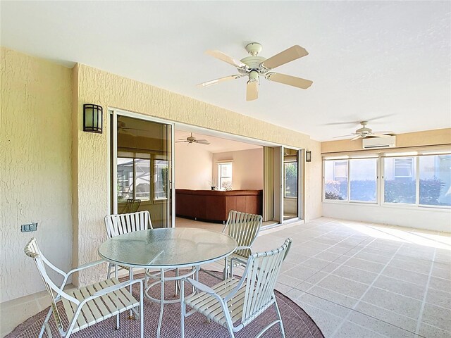 2202 Kershaw Rd, The Villages, FL 32162 - sunroom / solarium featuring healthy amount of natural light and an AC wall unit