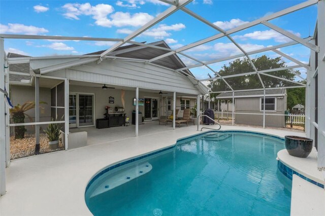 12401 Blue Heron Way, Leesburg, FL 34788 - outdoor pool with ceiling fan, a patio, and a lanai