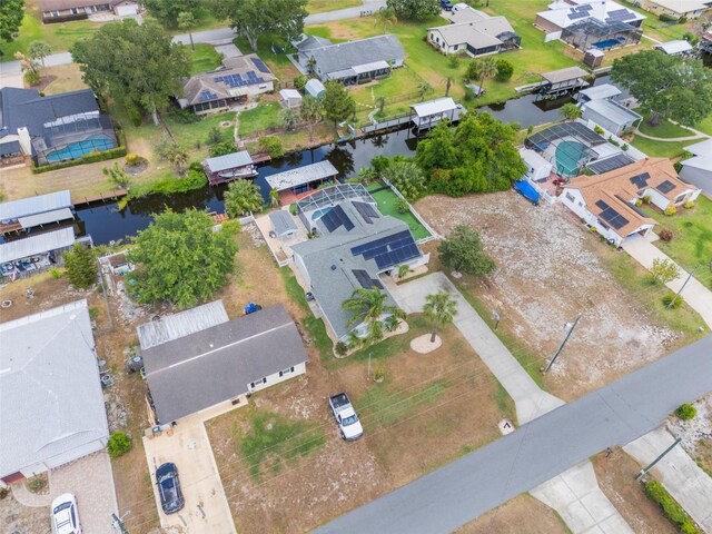 12401 Blue Heron Way, Leesburg, FL 34788 - aerial view of property and surrounding area featuring nearby suburban area and a large body of water