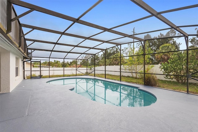 2304 Clementine Trl, Clermont, FL 34714 - view of swimming pool with a patio area, a fenced backyard, and glass enclosure