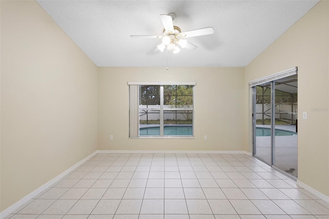 2304 Clementine Trl, Clermont, FL 34714 - spare room featuring a ceiling fan, healthy amount of natural light, and a textured ceiling