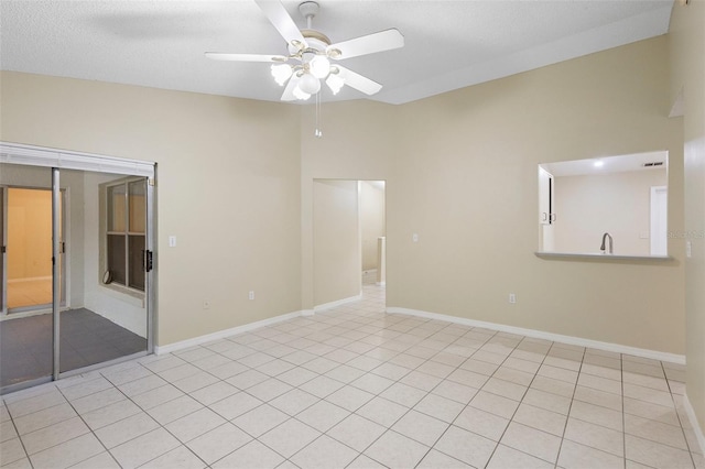 2304 Clementine Trl, Clermont, FL 34714 - spare room featuring a ceiling fan and baseboards