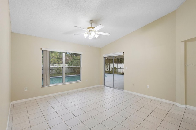 2304 Clementine Trl, Clermont, FL 34714 - empty room featuring vaulted ceiling, a ceiling fan, and a textured ceiling