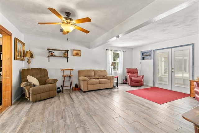 800 Jefferis Ct, Eustis, FL 32726 - living area featuring french doors, wood finished floors, ceiling fan, and baseboards