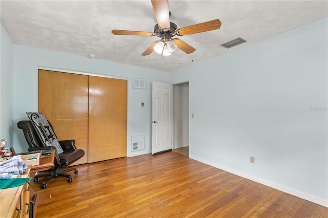 800 Jefferis Ct, Eustis, FL 32726 - unfurnished office featuring light wood-style floors, baseboards, and a ceiling fan
