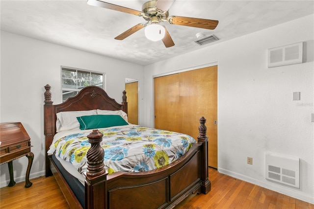 800 Jefferis Ct, Eustis, FL 32726 - bedroom featuring baseboards, light wood finished floors, a closet, and a ceiling fan