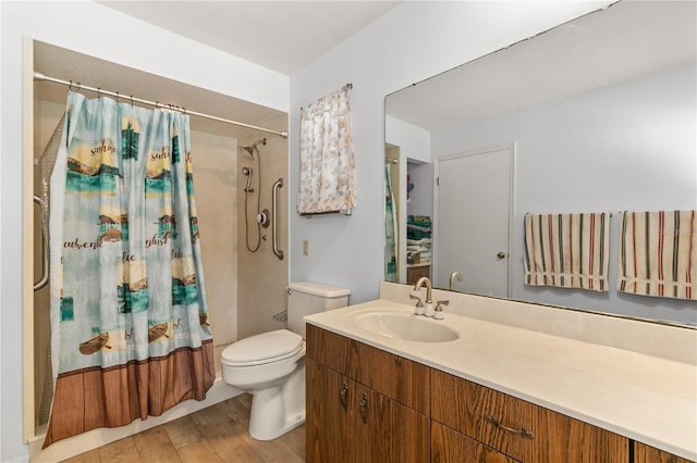 800 Jefferis Ct, Eustis, FL 32726 - bathroom featuring a shower with shower curtain, toilet, vanity, and wood finished floors