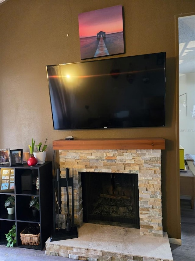 1051 S Highland St Unit 4-E, Mount Dora, FL 32757 - detailed view of a fireplace and wood finished floors