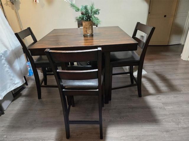 1051 S Highland St Unit 4-E, Mount Dora, FL 32757 - dining space with wood finished floors