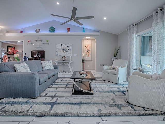 living area featuring vaulted ceiling, ceiling fan, arched walkways, healthy amount of natural light, and recessed lighting