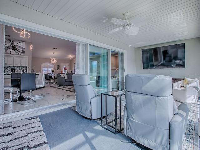 view of patio / terrace featuring a ceiling fan
