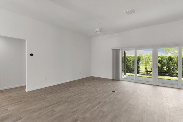 3745 Causey Ct, The Villages, FL 32163 - unfurnished room featuring wood finished floors, a ceiling fan, and baseboards