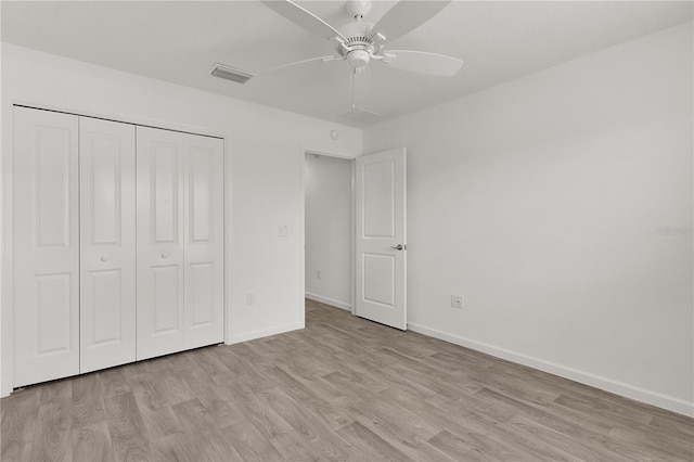 3745 Causey Ct, The Villages, FL 32163 - unfurnished bedroom with light wood-style floors, a closet, and baseboards