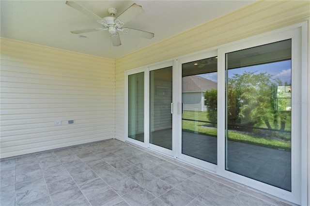 3745 Causey Ct, The Villages, FL 32163 - unfurnished sunroom with ceiling fan