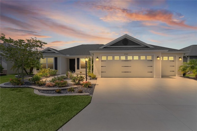 3745 Causey Ct, The Villages, FL 32163 - ranch-style house with a garage, concrete driveway, and a lawn
