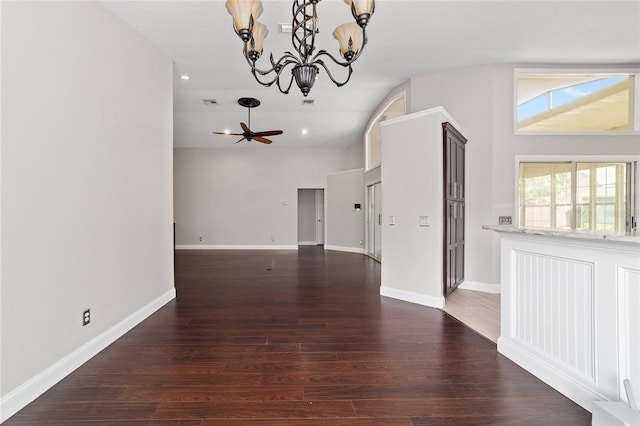 6259 SE 120th Pl, Belleview, FL 34420 - unfurnished living room featuring a chandelier, wood finished floors, baseboards, and recessed lighting