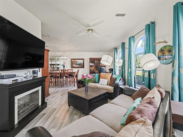 1202 Del Toro Dr, Lady Lake, FL 32159 - living area featuring ceiling fan and light wood-style flooring