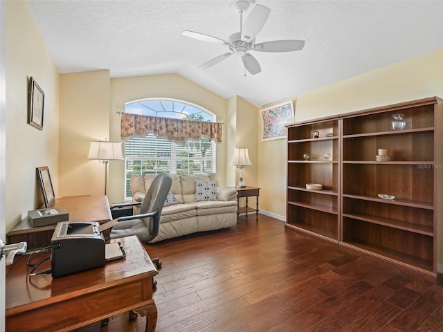 1642 Pennecamp Dr, The Villages, FL 32162 - office area featuring ceiling fan, lofted ceiling, wood finished floors, and a textured ceiling