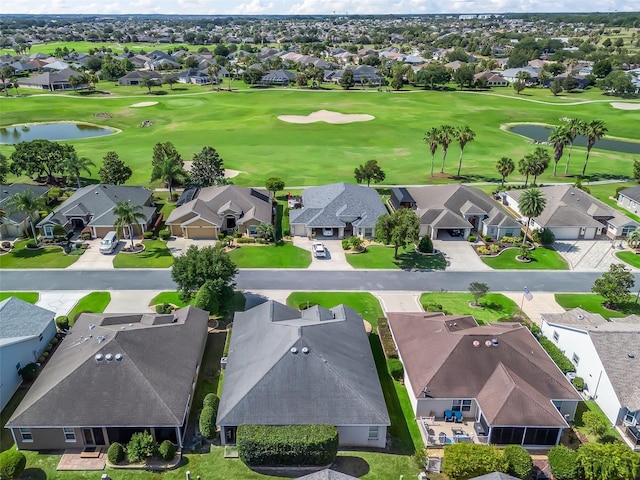 1642 Pennecamp Dr, The Villages, FL 32162 - aerial view of residential area with a large body of water and a golf club