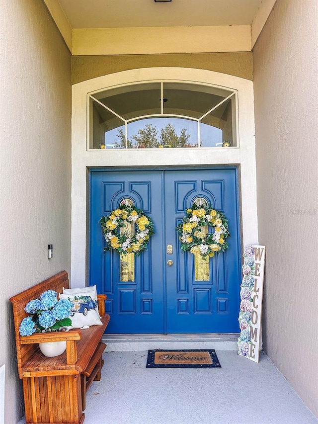 33818 Venice Ln, Sorrento, FL 32776 - doorway to property featuring stucco siding