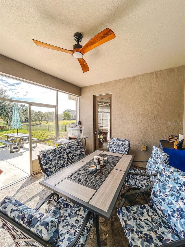 33818 Venice Ln, Sorrento, FL 32776 - living area with ceiling fan, a textured wall, and a textured ceiling