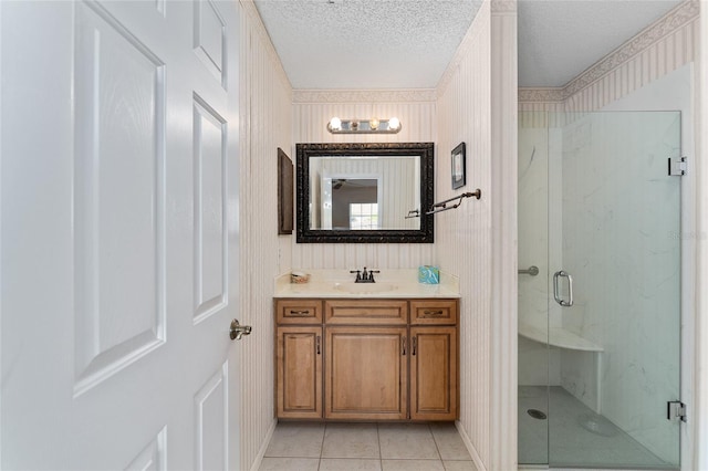 403 Duarte Ln, The Villages, FL 32159 - full bath featuring a textured ceiling, a marble finish shower, tile patterned floors, and vanity
