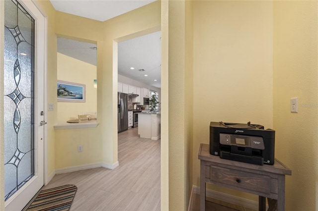 503 Vigo St, Davenport, FL 33837 - entryway with light wood-type flooring, baseboards, and recessed lighting