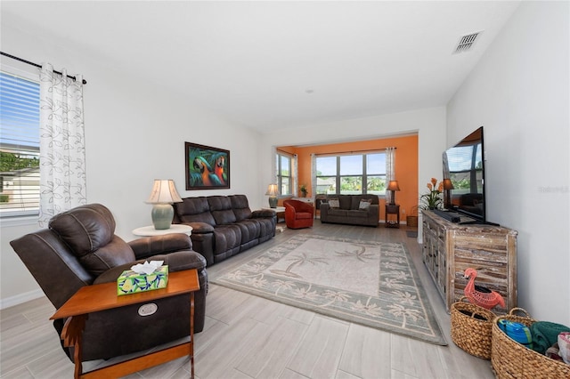 503 Vigo St, Davenport, FL 33837 - living room featuring wood finished floors and baseboards