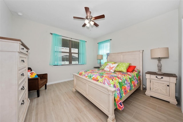 503 Vigo St, Davenport, FL 33837 - bedroom featuring light wood finished floors, baseboards, and ceiling fan