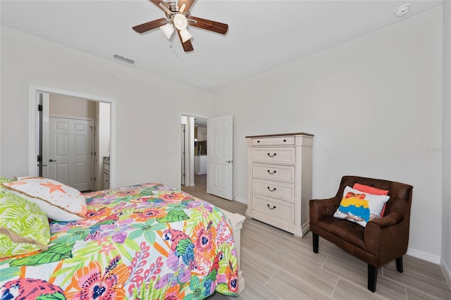 503 Vigo St, Davenport, FL 33837 - bedroom with baseboards, a ceiling fan, and wood finish floors