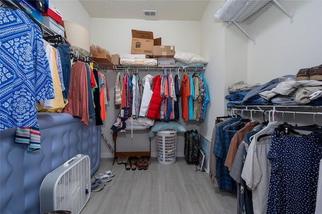503 Vigo St, Davenport, FL 33837 - spacious closet featuring wood finished floors
