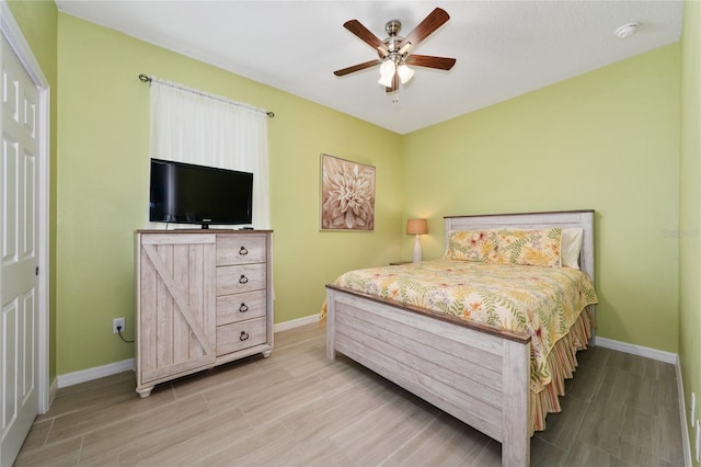 503 Vigo St, Davenport, FL 33837 - bedroom with baseboards and wood finish floors
