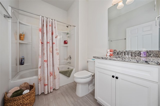 503 Vigo St, Davenport, FL 33837 - bathroom featuring shower / bath combo, vanity, toilet, and wood finished floors