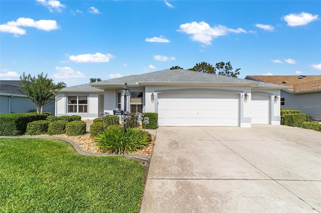 3393 Talley Ridge Dr, The Villages, FL 32162 - single story home featuring a garage, driveway, stucco siding, and a front yard