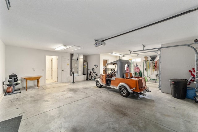 3393 Talley Ridge Dr, The Villages, FL 32162 - garage with water heater, a garage door opener, and heating unit