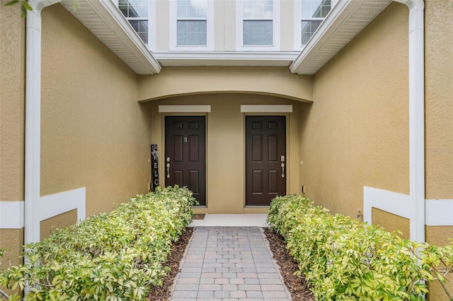 14430 Desert Haven St Unit 4302, Windermere, FL 34786 - view of exterior entry featuring stucco siding